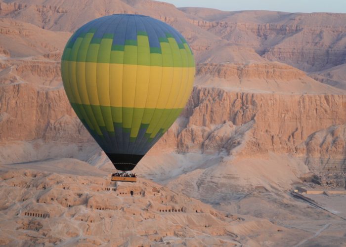 Tourists in a hot air balloon ride fly over the Valley of Kings in the southern city of Luxor, Egypt, Saturday, Oct. 4, 2025, where the tomb of Amenhotep III, who ruled ancient Egypt between 1390 B.C. and 1350 B.C., is opened to visitors for the first time in more than two decades. Photo: Amr Nabil/AP